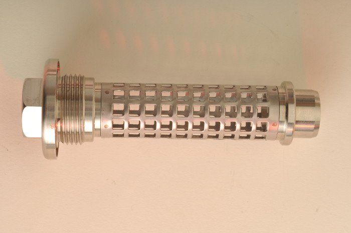 Woven metal mesh filters with synthetic overlay