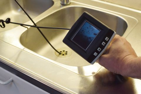 Checking Drain Pipe With Borescope Inspection Camera — Campbell’s Complete Plumbing in Tamworth, NSW Checking Drain Pipe With Borescope Inspection Camera — Campbell’s Complete Plumbing in Tamworth, NSW