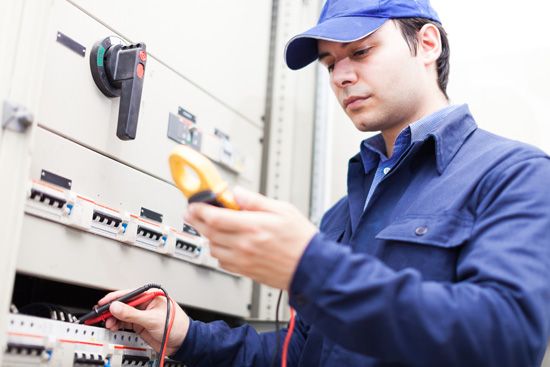 Electrician Testing Electric Power