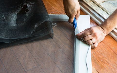 Storm Doors — Staff Repairing Door Screen in Pittsburg, PA
