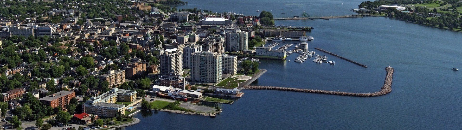 An aerial view of a city next to a body of water