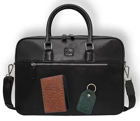 A black briefcase with a wallet and a keychain in it