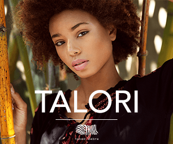 A woman is standing next to a bamboo pole and the word talori is on the bottom