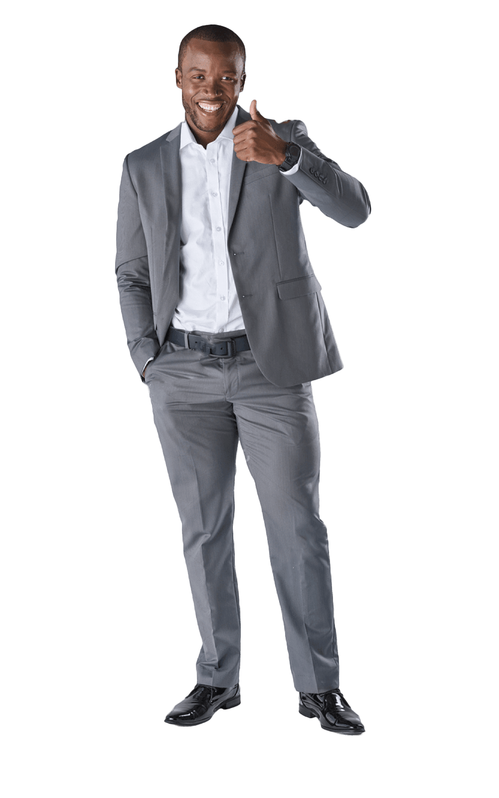 A man in a suit is giving a thumbs up.