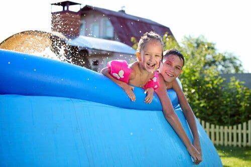 Outdoor Pools — Happy Children Enjoying Swimming in Manchester, CT Outdoor Pools — Happy Children Enjoying Swimming in Manchester, CT