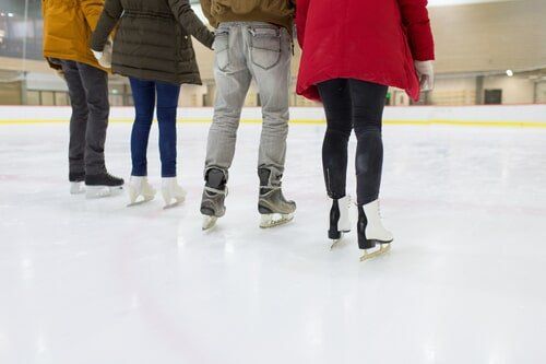 Skating Rinks — Family Enjoying Ice Skating in Manchester, CT Skating Rinks — Family Enjoying Ice Skating in Manchester, CT