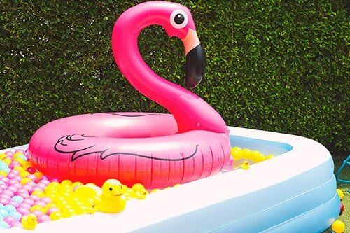 Outdoor Swimming Pool — Blow Up Pool with Inflatable Flamingo in Manchester, CT Outdoor Swimming Pool — Blow Up Pool with Inflatable Flamingo in Manchester, CT