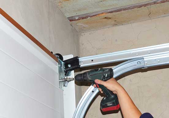 Installing Lifting System - Garage Door Installation in Knoxville, TN