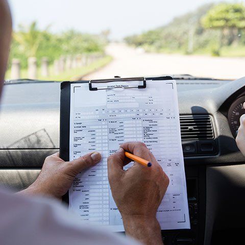 Girl Taking Driving Test — ABC Driving School in Central Coast NSW Girl Taking Driving Test — ABC Driving School Central Coast In Umina Beach, NSW