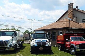 Residential house with cars — Home heating oil in Osceola Mills, PA