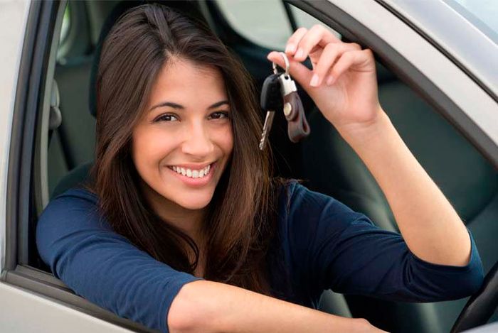 girl holding keys, girl receives licence