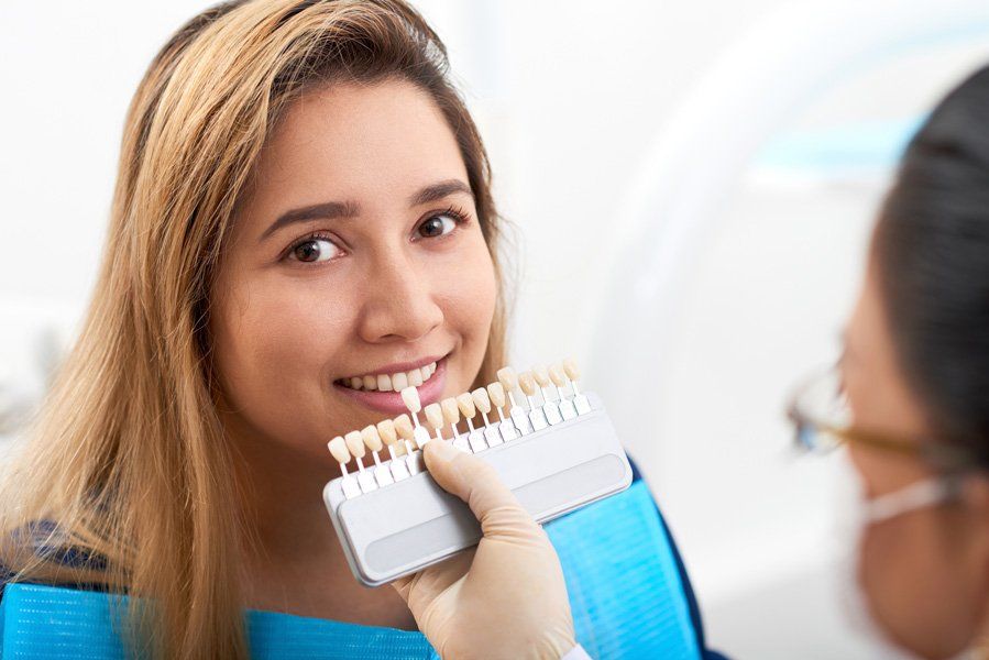Women Choosing Color Of Veneers — Baker, LA — Rabel Family Dentistry