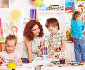 children with the nursery staff