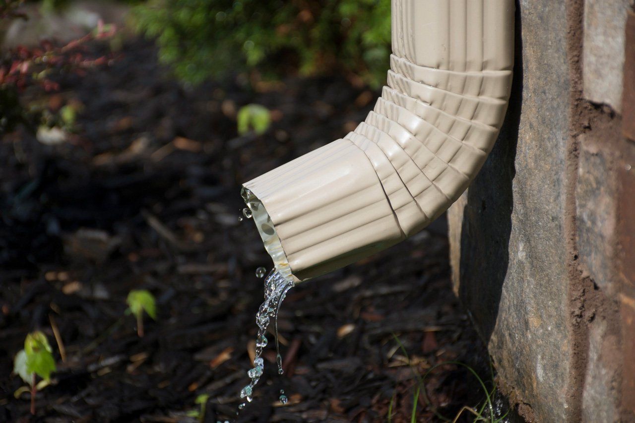 Gutter Downspout with Water — Ft. Walton Beach, FL — Architectural Gutter Systems