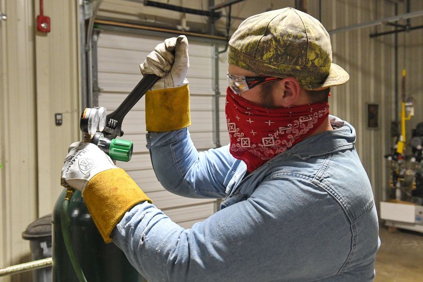Local 538 Apprentice using a large wrench