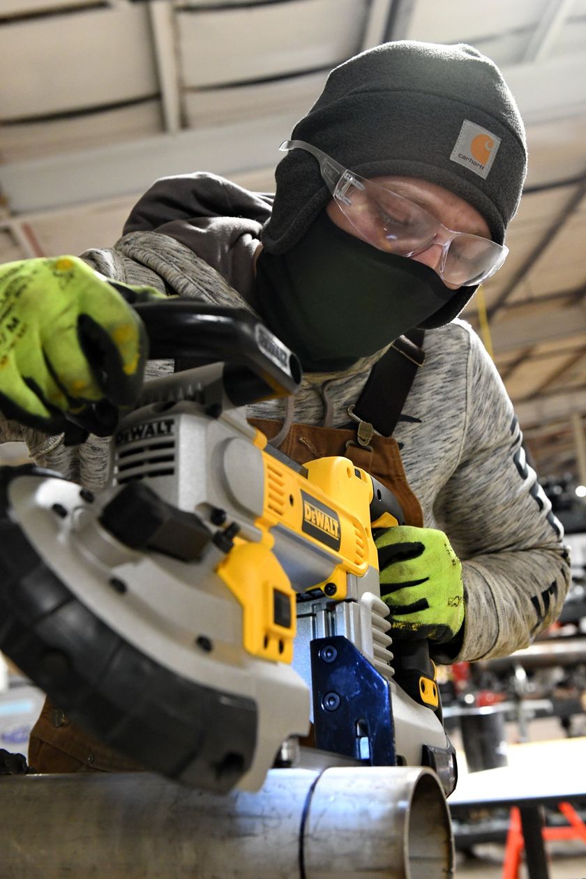 Local 538 Apprentice using heavy machinery