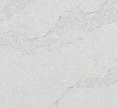 Light grey stone surface with a fine, speckled texture and subtle, darker diagonal veining.