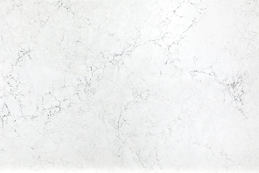 White marble surface with subtle, light grey veining throughout.