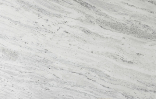 Light gray marble slab featuring soft, diagonal veining and subtle white textures.