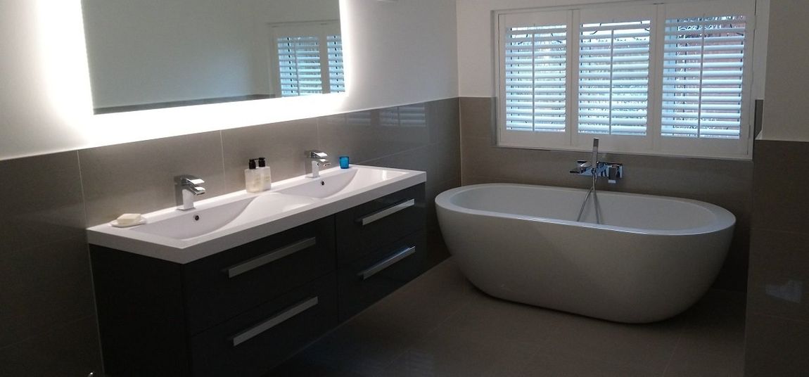 Bathroom Full Height Shutters Installation plantation shutters waterproof Sutton Coldfield Plantation Shutters recent installation  Vesey Estate  Streetly Birmingham West Midlands  England UK