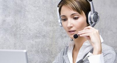 A lady with a headset on
