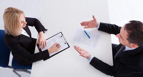 A man and woman discussing something