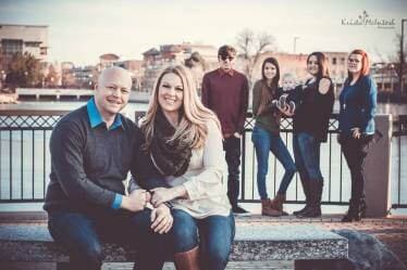 Couple with Their Children on the Background - Photography in Colorado Springs, CO