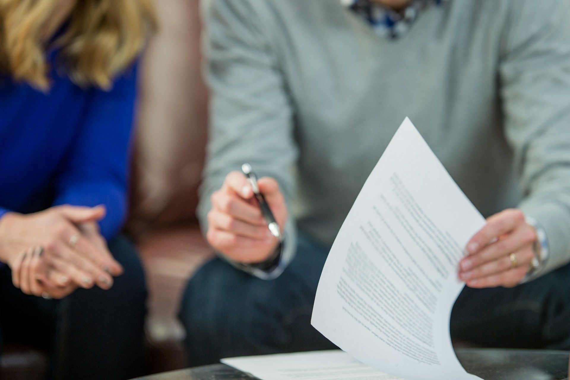 Couple Signing Lease