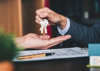 Home Rental — Giving Keys to the Woman in Salisbury, MD Home Rental — Giving Keys to the Woman in Salisbury, MD