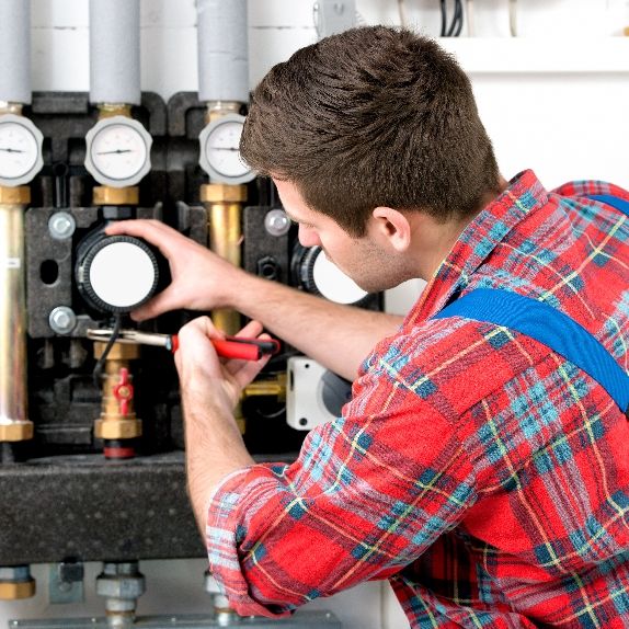 Heating expert doing repairs