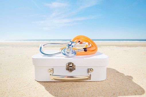 travel medicine with suitcase