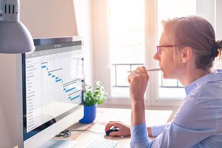 Debt Monitor —  Woman Monitoring a Graph in  Redding, CA