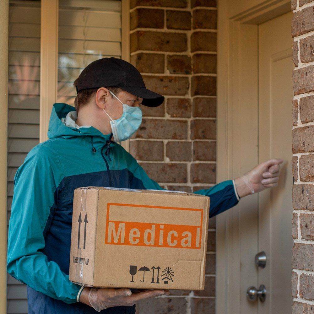 Man Delivering Medical Package — Arlington, TX — Pronto Courier Delivery and Logistics