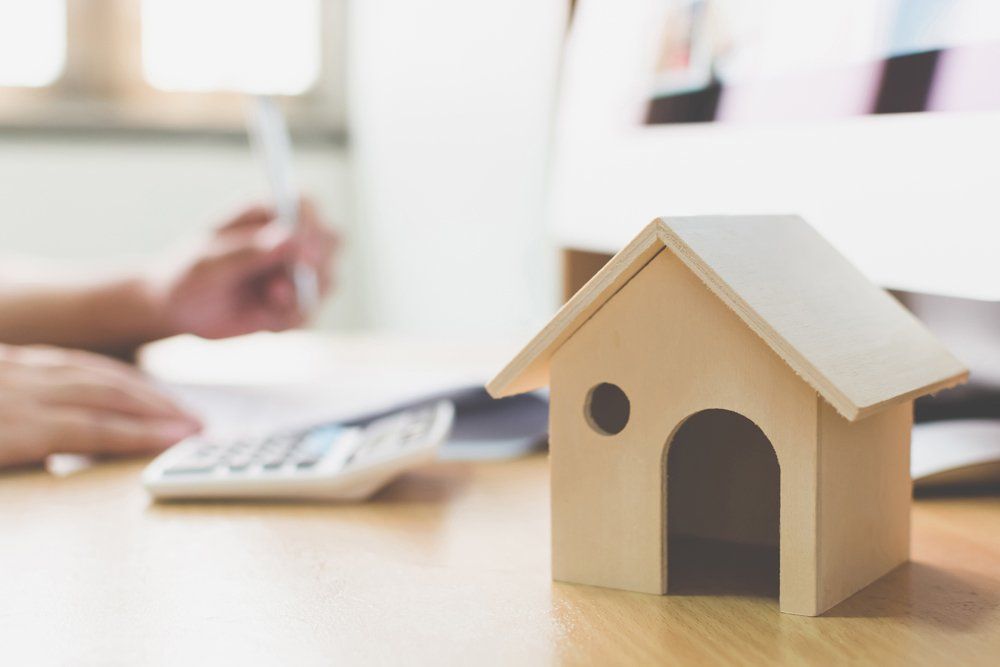 Homeowners Insurance — Signing Home Insurance Paper in Largo, MD