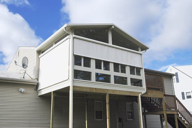 A house with a satellite dish on top of it