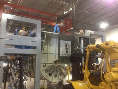 Man Moving Machinery with Forklift - Heavy Equipment Movers in Tampa, FL