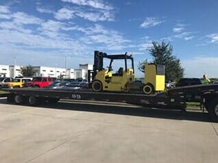 Placing Equipment on Flatbed - Rigging Contractor in Tampa, FL Placing Equipment on Flatbed - Rigging Contractor in Tampa, FL