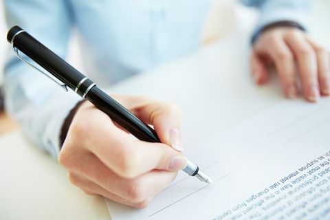 Businessman touching pen—bond insurance in County, MN Businessman touching pen—bond insurance in County, MN