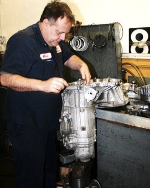 Employee working on parts