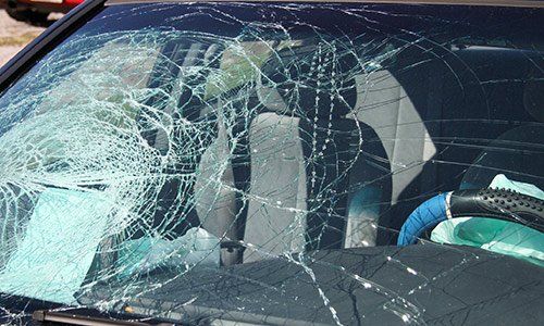 A windshield in Chatham, IL, that needs auto glass services