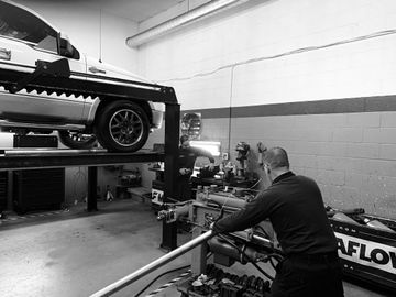 Worker at Work — Springfield, MA — Ed's Custom Muffler