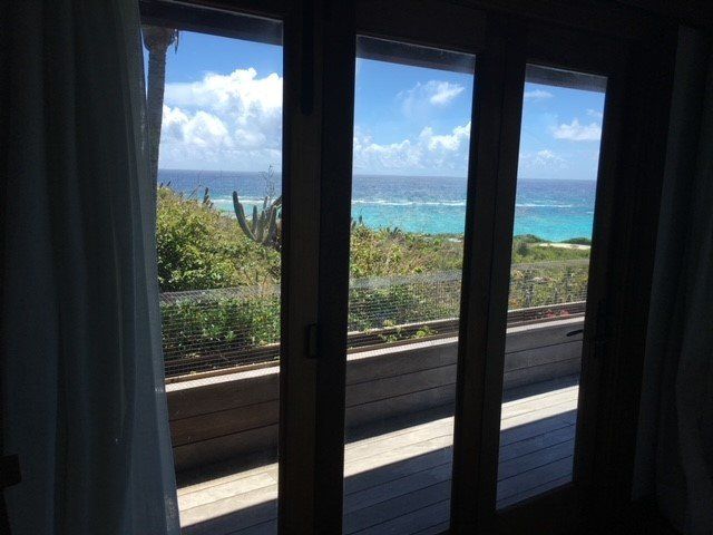 Glass Door With Curtains — Miami, FL — Solar Tint, Inc.