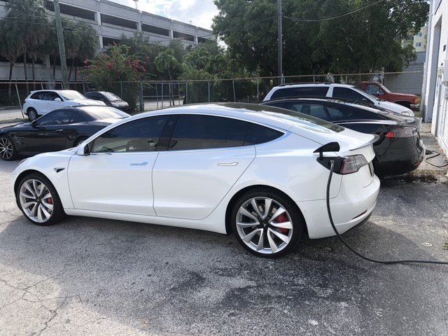 Cars In A Parking Lot — Miami, FL — Solar Tint, Inc.