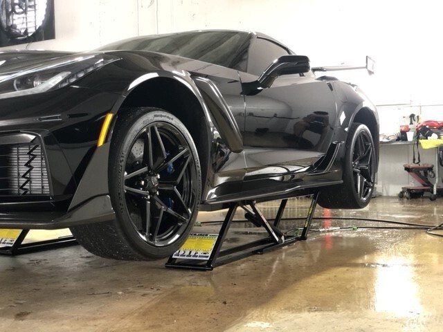 Side Of A Black Car With Tinted Glass — Miami, FL — Solar Tint, Inc.