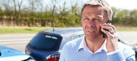 Man Talking to the Phone — Auto Insurance in Reno, NV