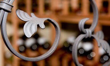 Custom Fencing — Metal Fence With a Leaf Design in Marion, IL Custom Fencing — Metal Fence With a Leaf Design in Marion, IL