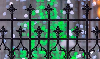 Ornamental Fencing — Black Fence With Flower Design in Marion, IL Ornamental Fencing — Black Fence With Flower Design in Marion, IL