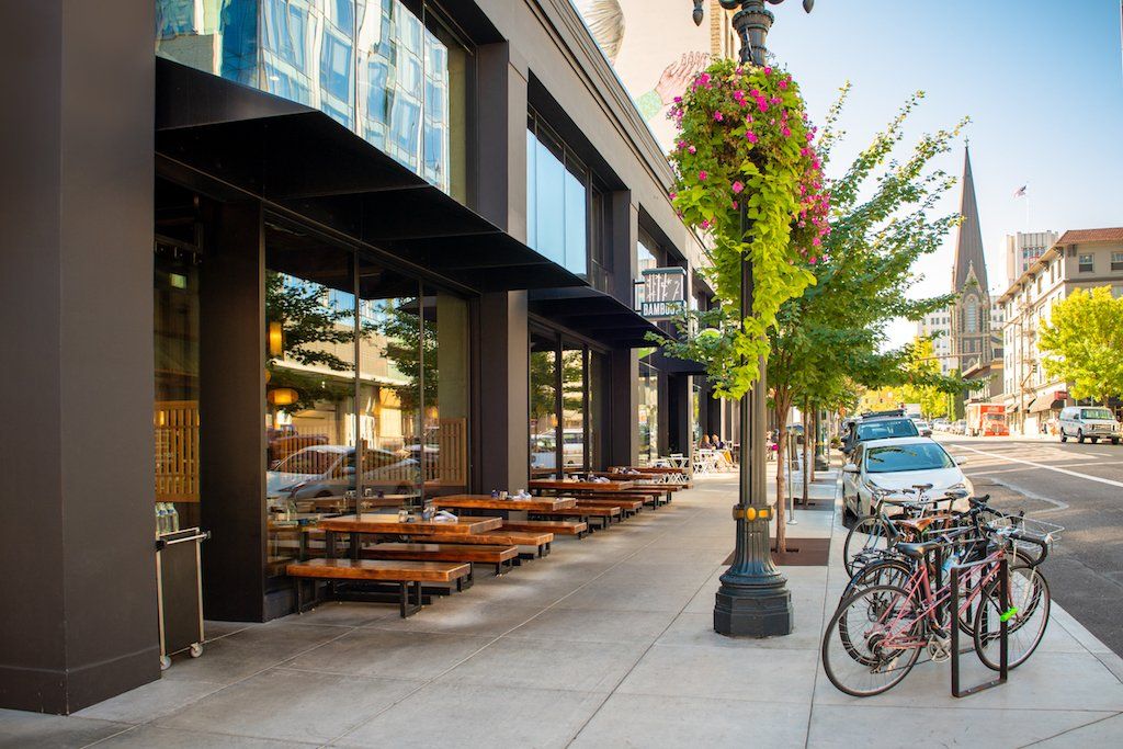 Spencer Court Street View with businesses and bikes