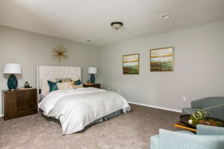 There is a large bed in the middle of the room.