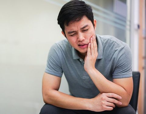 Man Feeling Hurt From Toothache — Clarkston, MI — Mark Frenchi DDS Man Feeling Hurt From Toothache — Clarkston, MI — Mark Frenchi DDS
